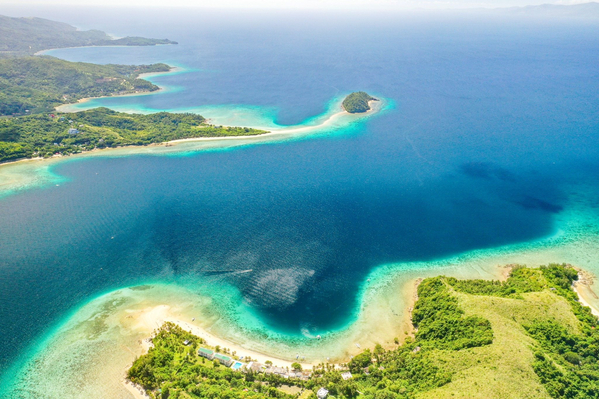 Aerial view of House Reef and the resort